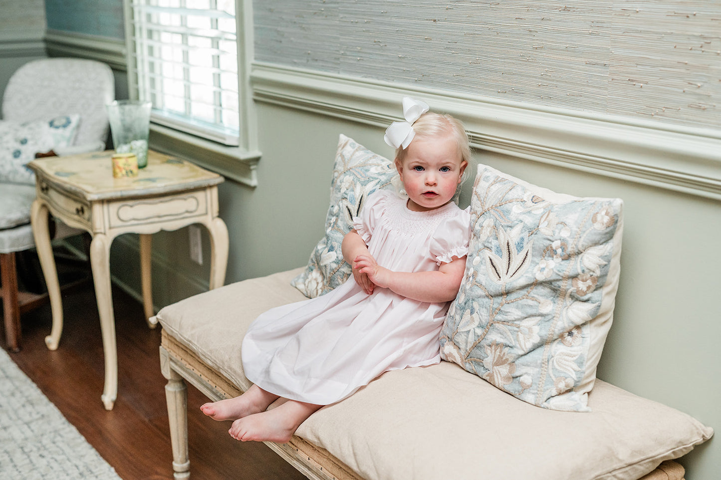 girl sitting in The Vivi Bishop