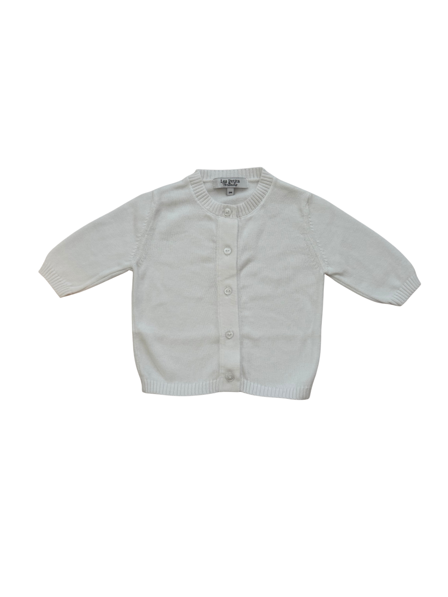 A white long-sleeve knit cardigan sweater for toddlers, featuring a button-up front and ribbed collar, cuffs, and hem, laid flat against a white background.