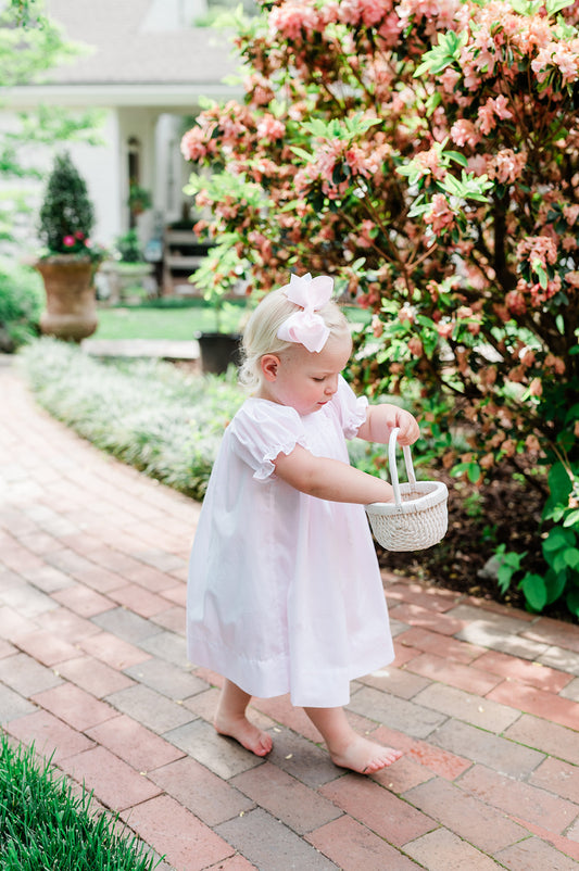 The Vivi Bishop girl walking with basket