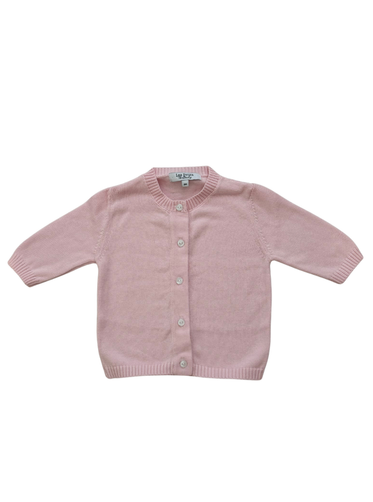 A light pink knit cardigan sweater for toddlers, featuring long sleeves, a round neckline, and a button-up front, displayed flat against a solid white background.
